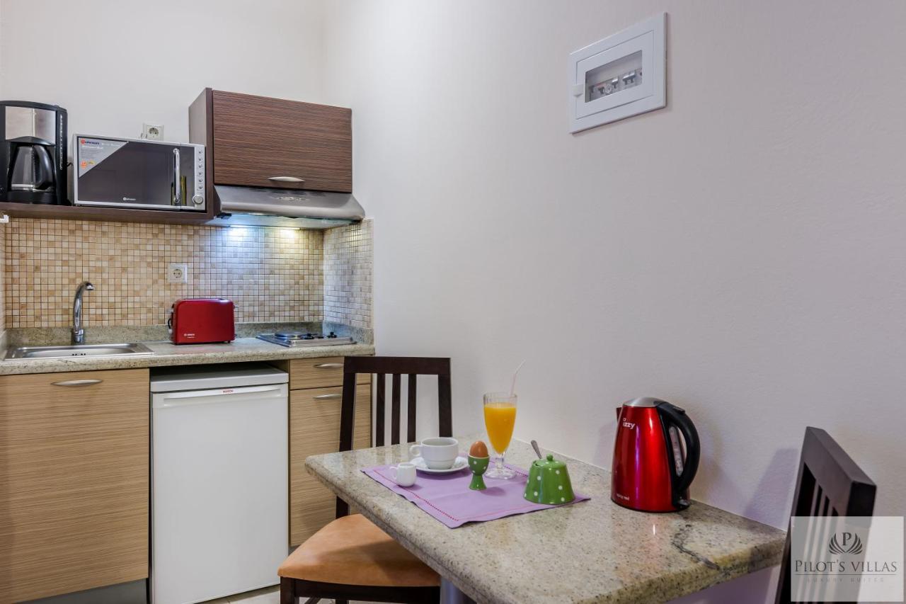 Pilot'S Villas Luxury Suites แอร์ซอนิสซอส ภายนอก รูปภาพ
